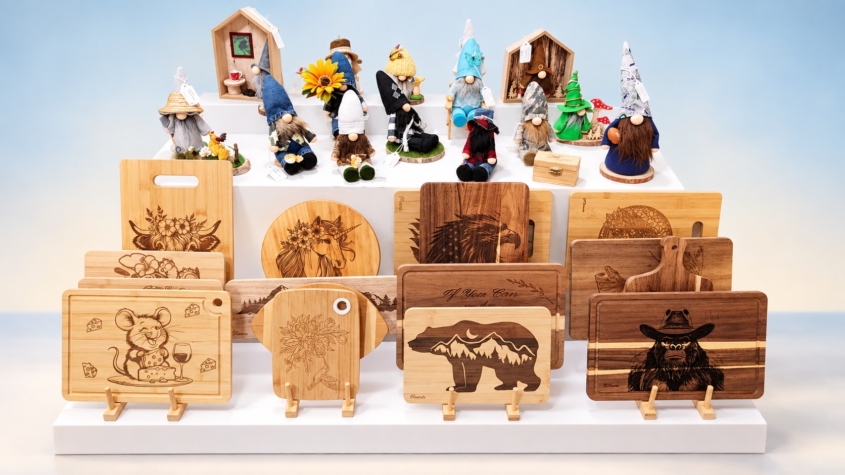 Engraved wood cutting boards and handmade gnomes on display
