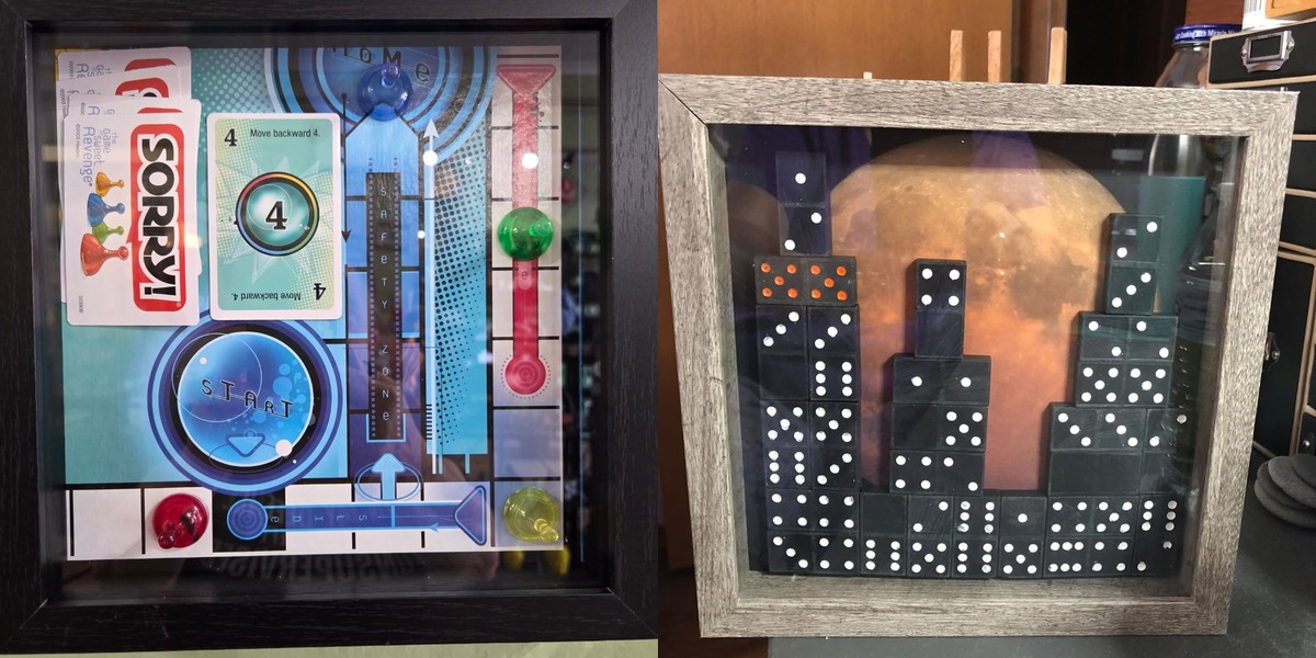 Handmade shadow box art by Karen Kidney featuring a Sorry! game board design and a domino cityscape under a moon