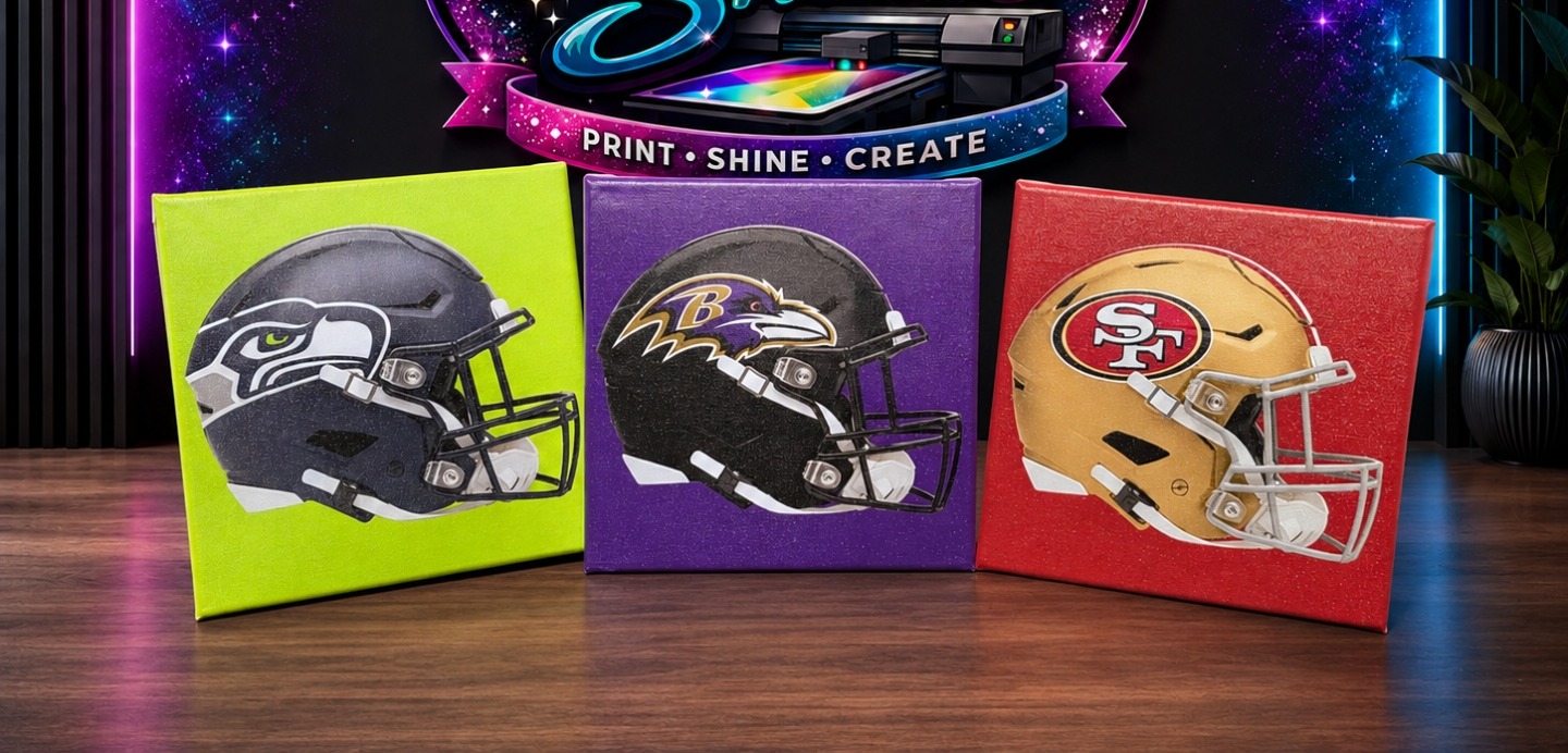 UV-printed sports team helmet canvases by Morvee Shine Shack in Seahawks, Ravens, and 49ers colors